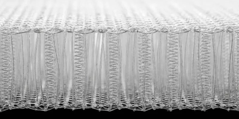 Macro cross-section of 3D air mesh showing vertical monofilament core.