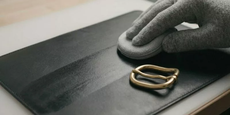 Spot-Treat the Lining and Dry-Wipe the Hardware