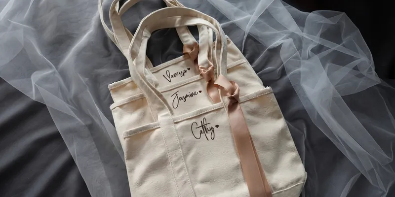 Canvas gift tote with a ribbon tie under sheer tulle