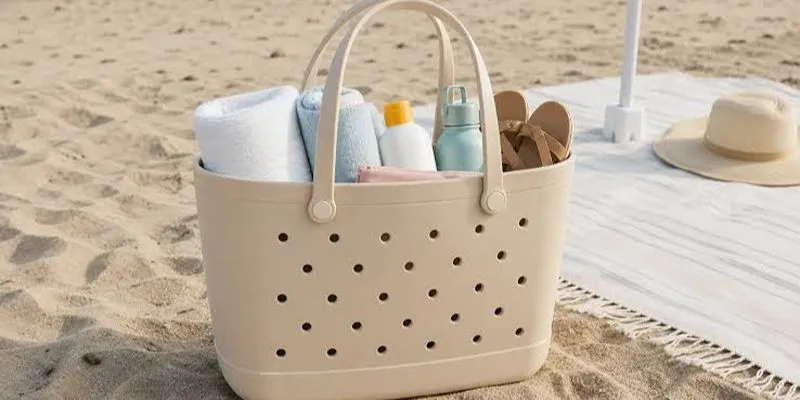 Beige molded EVA beach basket tote with a flat base and drainage holes