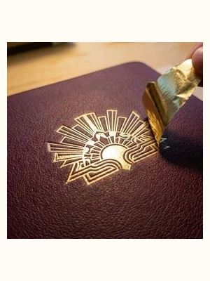 Hot foil stamping and debossed logo on bag leather
