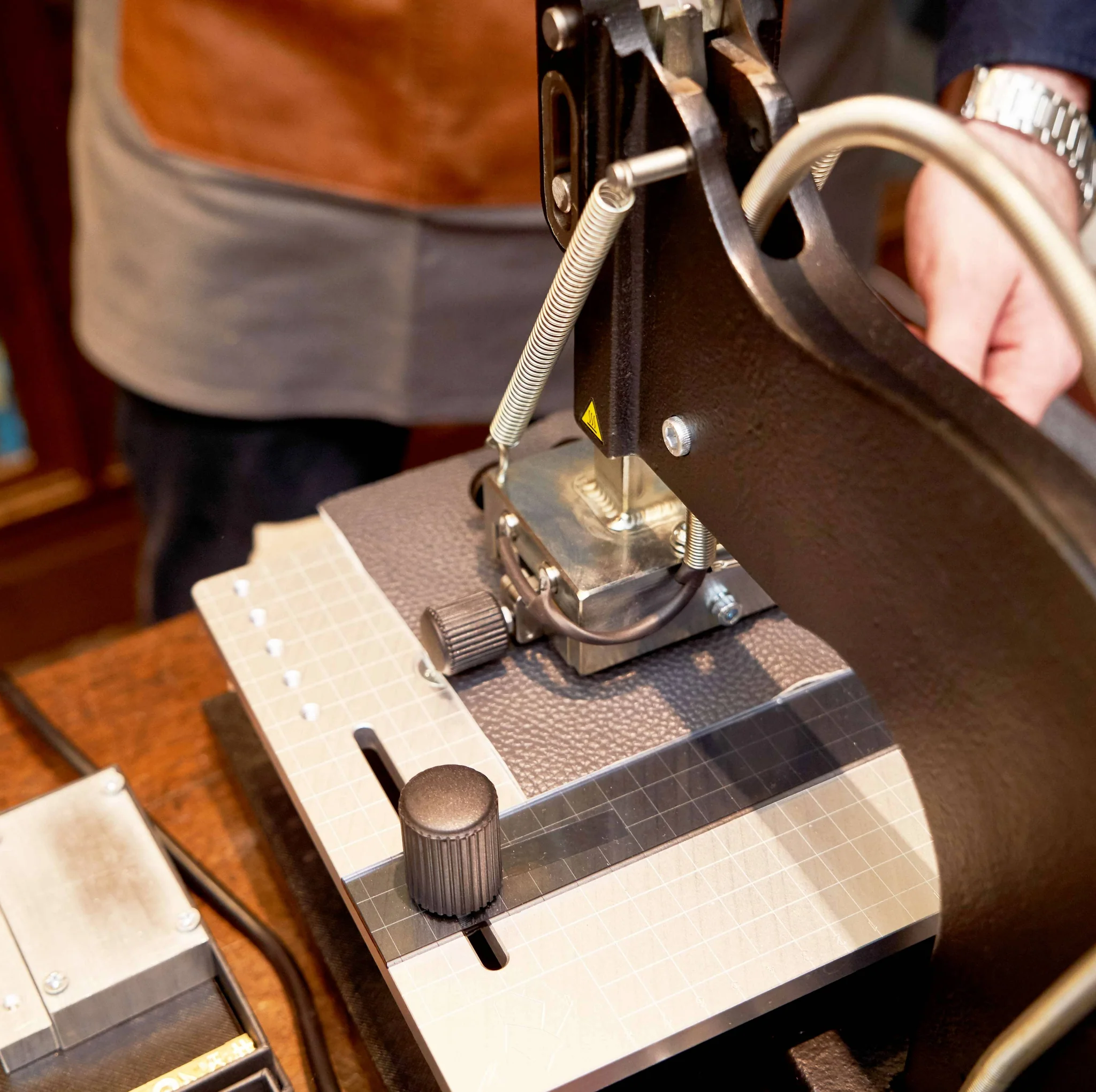 Hot foil stamping and embossing on bag surfaces